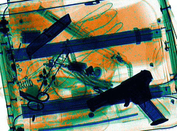 X-ray image illustrating how airport security scanners use X-ray radiation to inspect the contents of luggage.