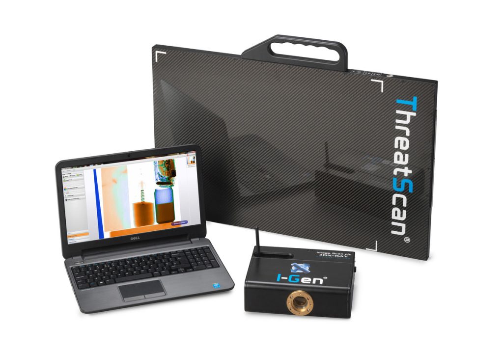 Portable ThreatScan X-ray inspection system with flat panel scanner, laptop displaying scan results, and I-Gen control unit.