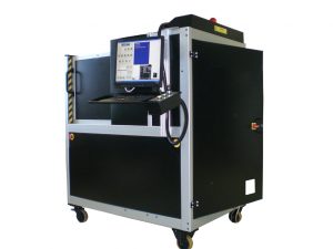 Enclosed industrial X-ray inspection machine with touchscreen control panel, operator interface, and mobile wheeled base.